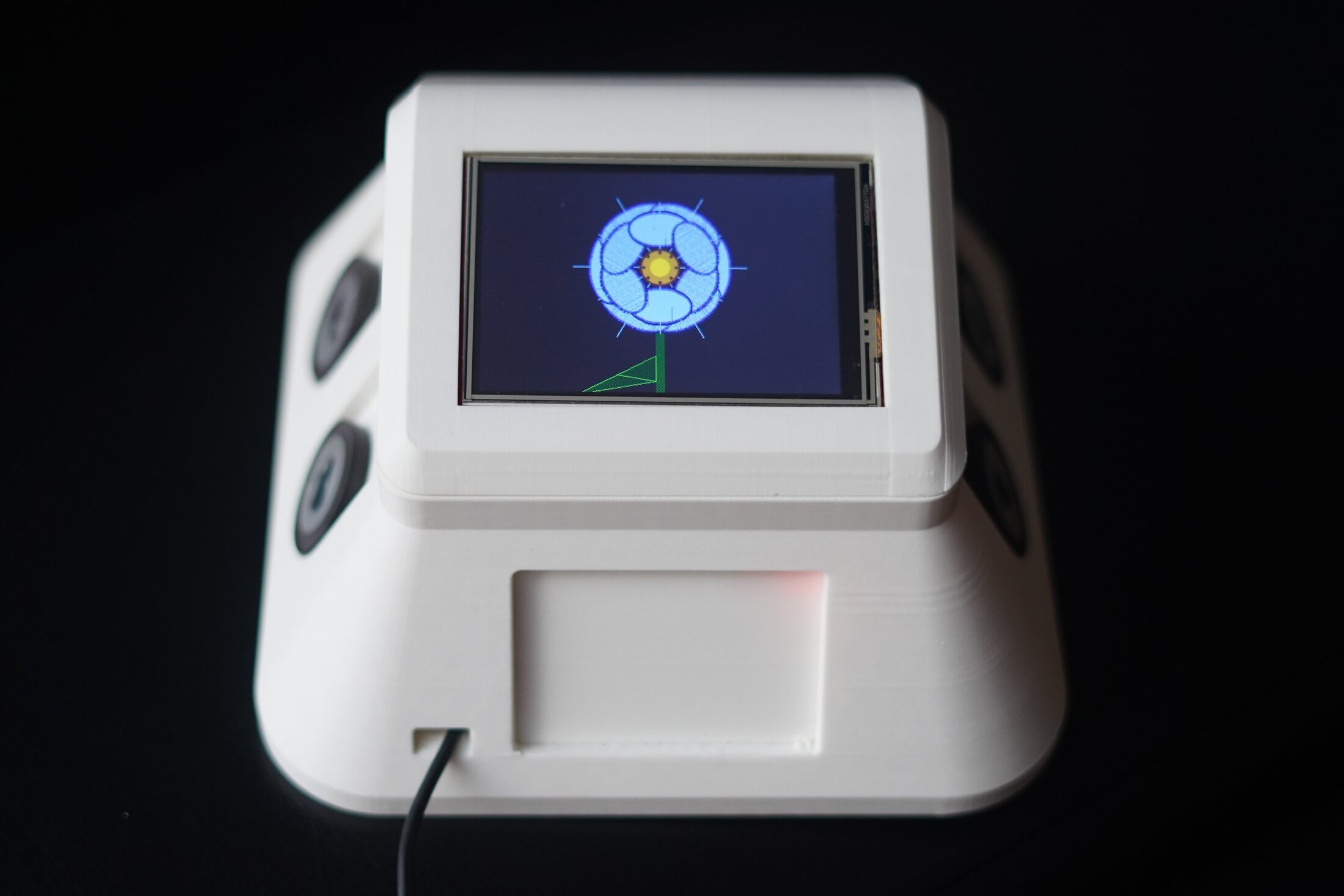 Final Teleflora prototype running with a blue drawn flower on the screen