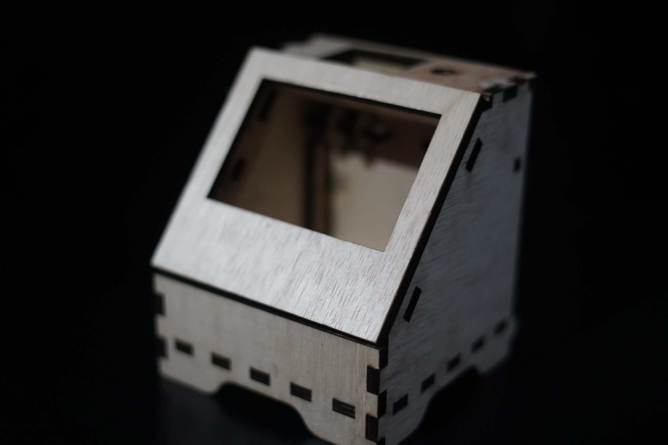 Laser-cut wooden angled enclosure with window for the TFT display